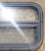 Used Black Radius Opening Window : 23 1/2" W x 14 1/2" H x 1 3/4" D - Young Farts RV Parts