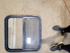 Used Black Radius Opening Window : 25 1/2" W x 25 1/2" H x 1 3/4" D - Young Farts RV Parts
