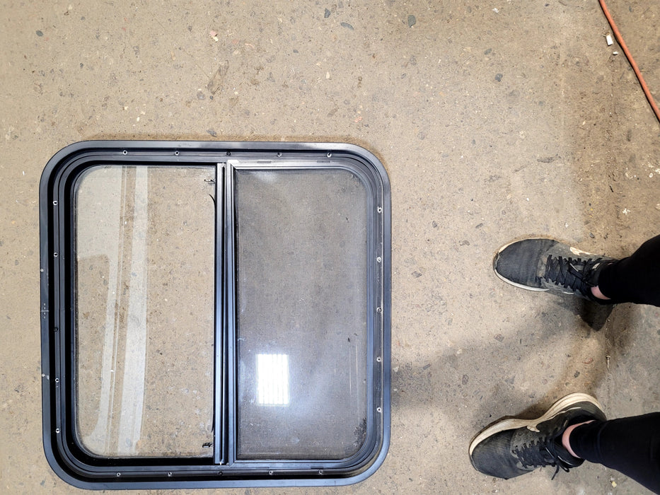 Used Black Radius Opening Window : 25 1/2" W x 25 1/2" H x 1 3/4" D - Young Farts RV Parts