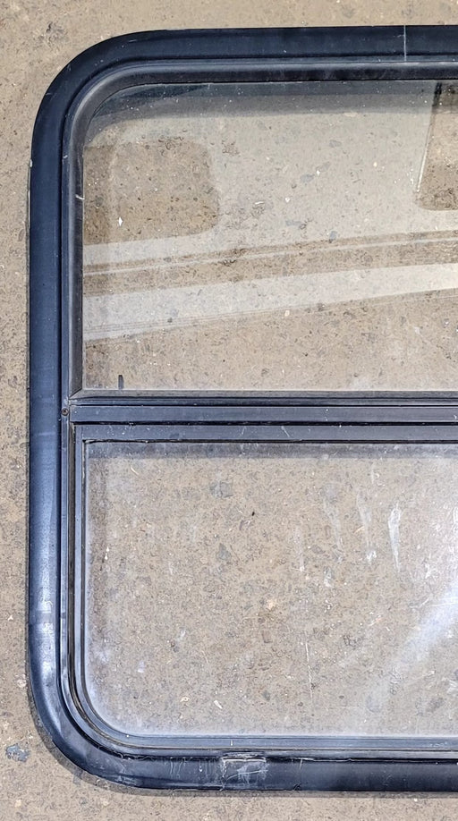 Used Black Radius Opening Window : 25 1/2" W x 25 1/2" H x 1 3/4" D - Young Farts RV Parts