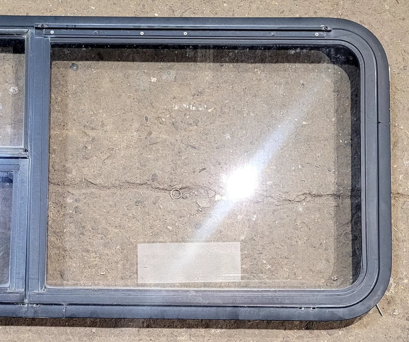 Used Black Radius Emergency Opening Window : 47 1/2" W x 21 1/4" H x 1 3/4" D - Young Farts RV Parts