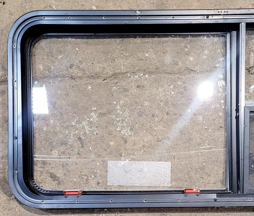 Used Black Radius Emergency Opening Window : 47 1/2" W x 21 1/4" H x 1 3/4" D - Young Farts RV Parts