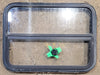 Used Black Radius Opening Window : 29 1/2" W x 21 1/4" H x 1 1/2" D - Young Farts RV Parts