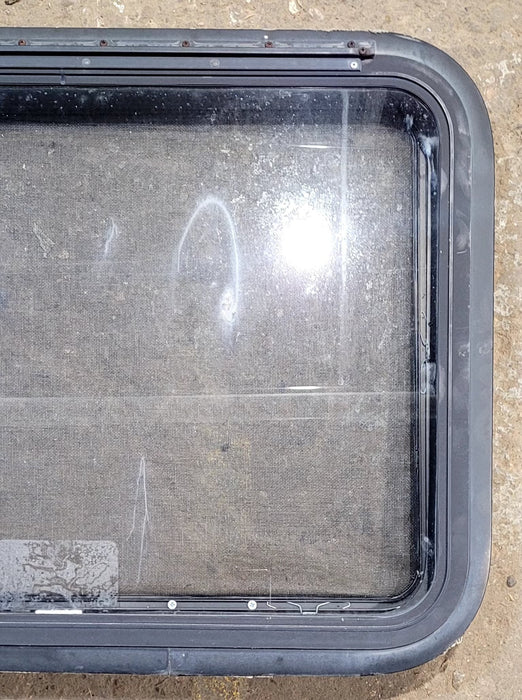 Used Black Radius Emergency Opening Window : 29 1/2" W x 21 1/2" H x 1 5/8" D - Young Farts RV Parts