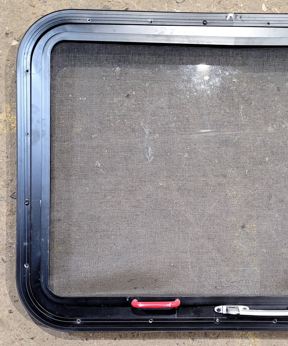 Used Black Radius Emergency Opening Window : 29 1/2" W x 21 1/2" H x 1 5/8" D - Young Farts RV Parts