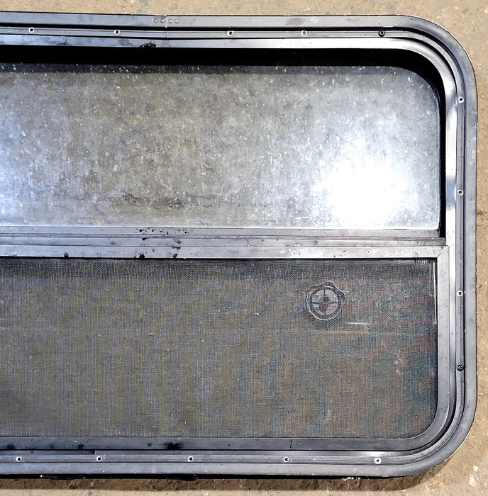 Used Black Radius Opening Window : 29 1/4" W x 21 1/4" H x 2" D - Young Farts RV Parts