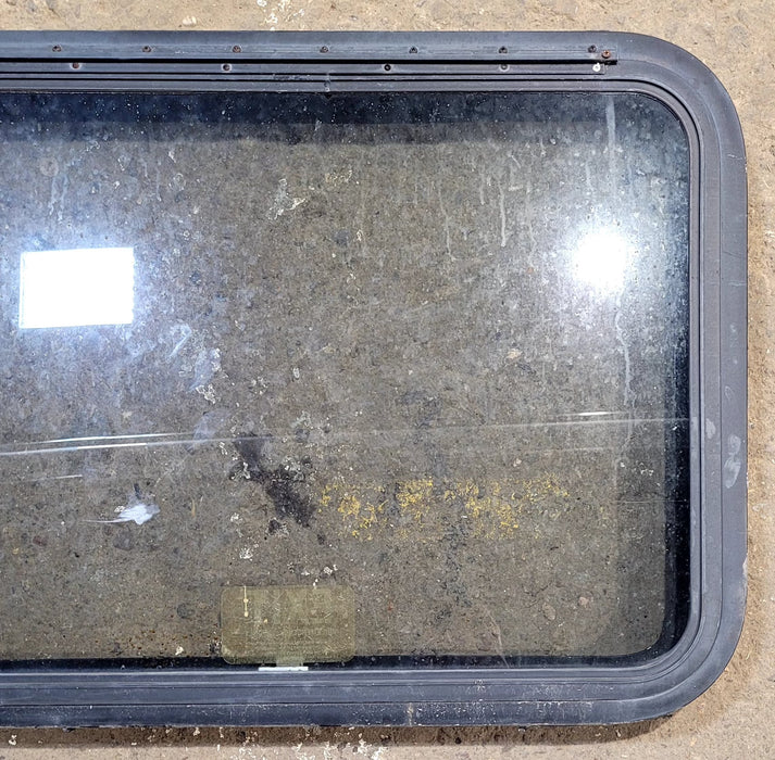 Used Black Radius Emergency Opening Window : 29 1/4" W x 21 1/4" H x 2" D - Young Farts RV Parts