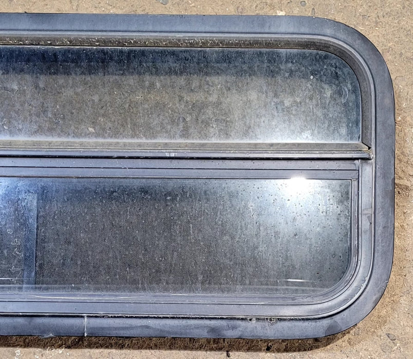 Used Black Radius Opening Window : 35 1/4" W x 14 1/4" H x 2" D - Young Farts RV Parts