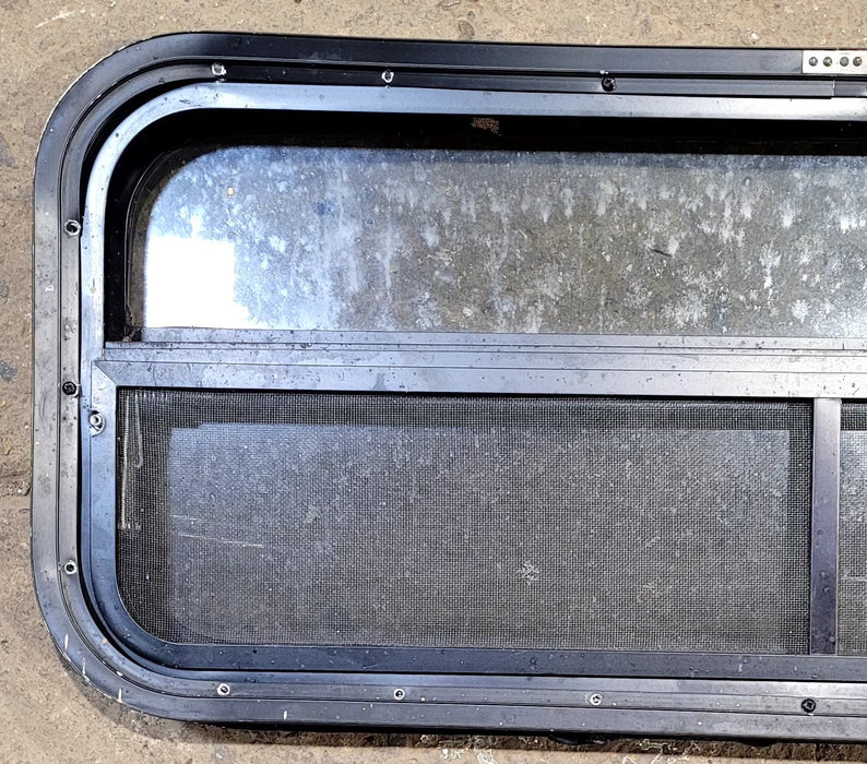 Used Black Radius Opening Window : 35 1/4" W x 14 1/4" H x 2" D