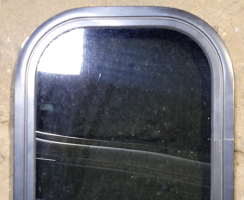 Used Black Radius Non Opening Window : 11 1/4" W x 18 1/4" H x 1" D - Young Farts RV Parts