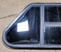 Used Slanted Black Radius Opening Window : 35 1/2" W x 14 3/4" H x 1 1/8" D - Young Farts RV Parts