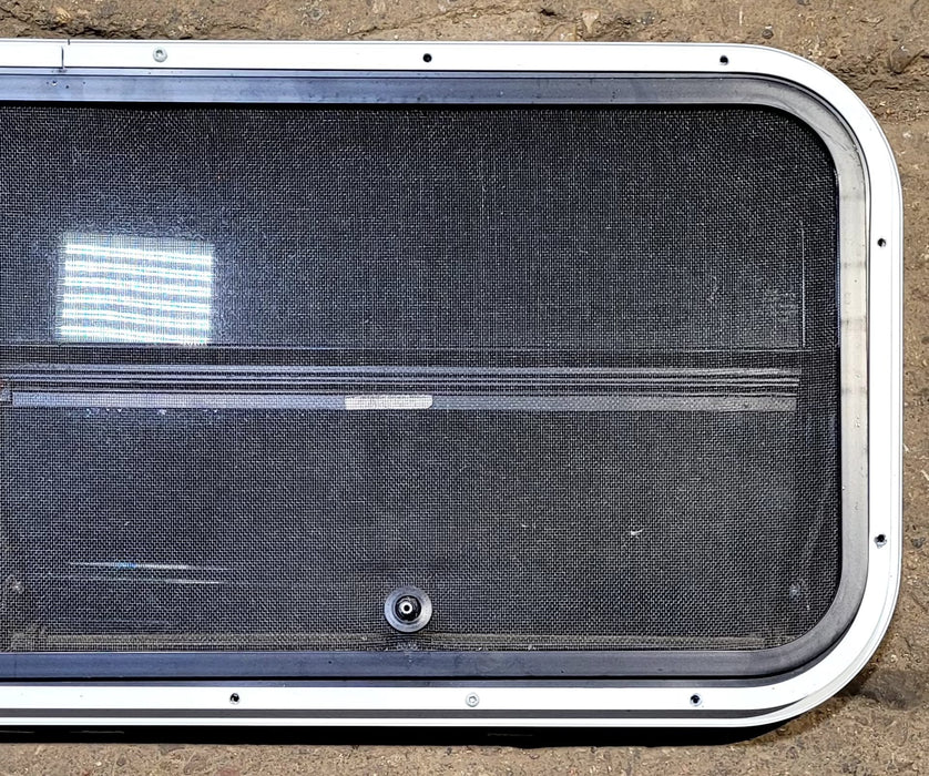 Used Slanted Black Radius Opening Window : 35 1/2" W x 14 3/4" H x 1 1/8" D - Young Farts RV Parts