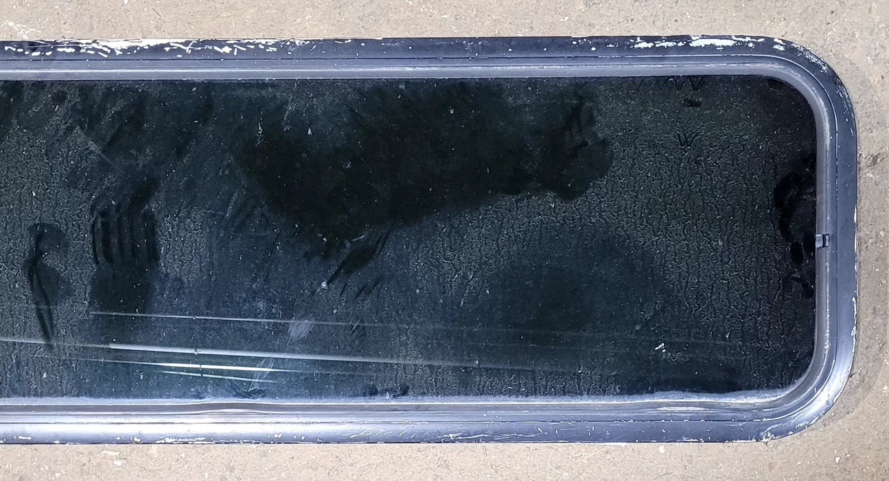 Used Black Radius Non Opening Window : 51 1/2" W x 14 1/4" H x 1" D - Young Farts RV Parts