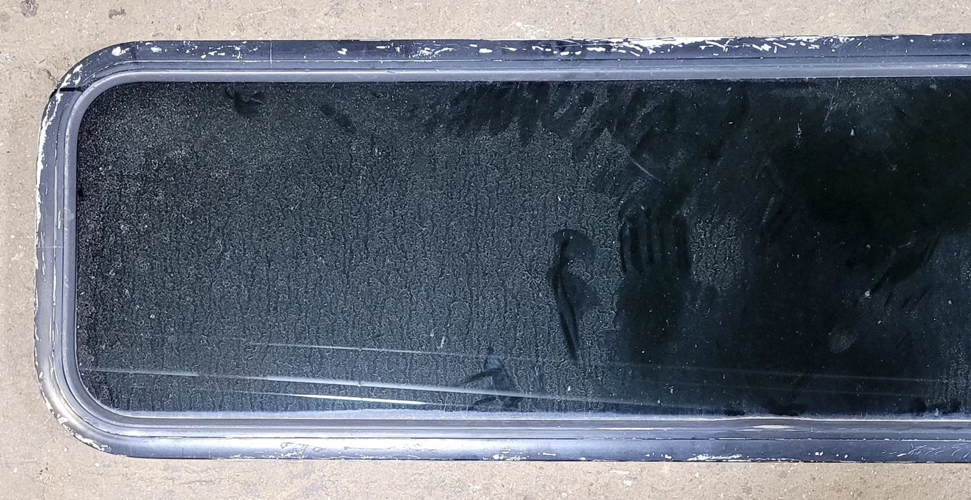 Used Black Radius Non Opening Window : 51 1/2" W x 14 1/4" H x 1" D - Young Farts RV Parts
