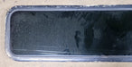 Used Black Radius Non Opening Window : 51 1/2" W x 14 1/4" H x 1" D - Young Farts RV Parts