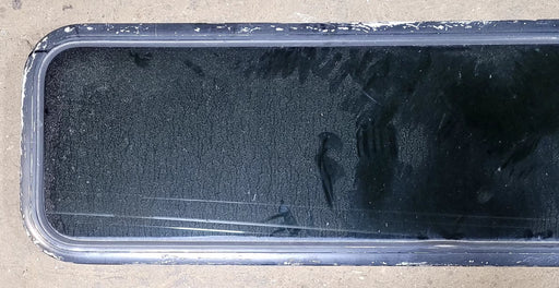 Used Black Radius Non Opening Window : 51 1/2" W x 14 1/4" H x 1" D - Young Farts RV Parts