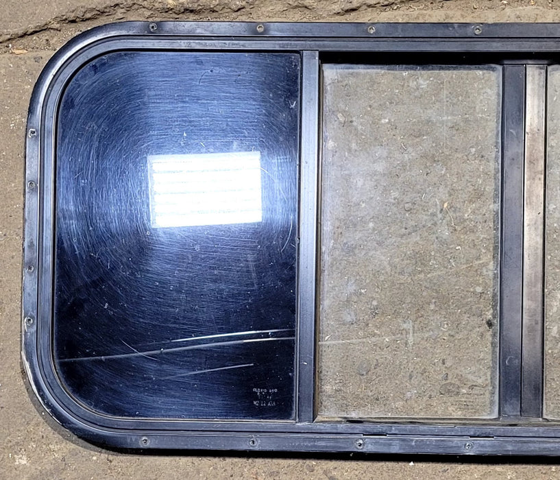 Used Black Radius Opening Window : 40 3/4" W x 16 3/4" H x 3/4" D - Truck Camper Front Slider - Young Farts RV Parts
