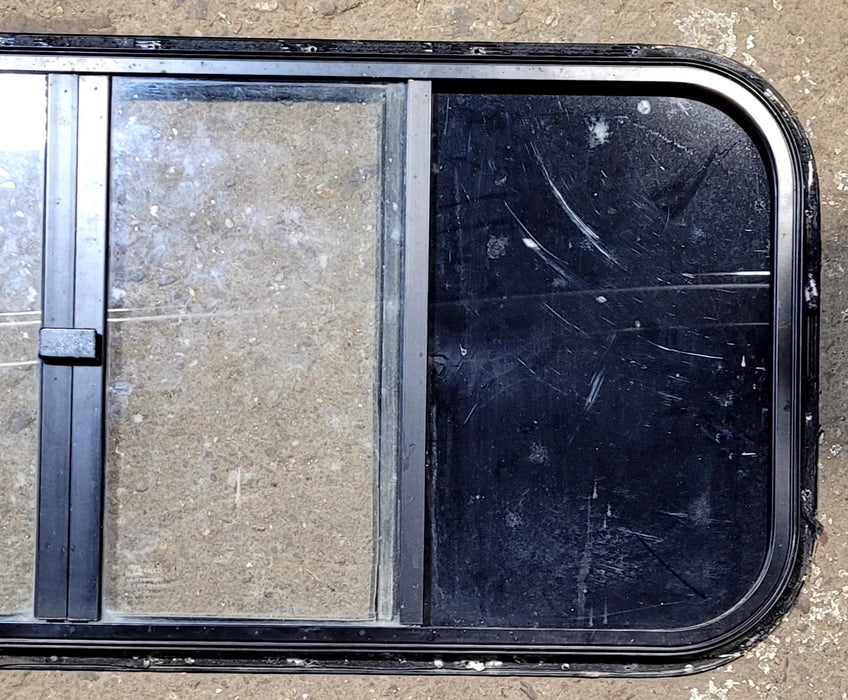 Used Black Radius Opening Window : 40 3/4" W x 16 3/4" H x 3/4" D - Truck Camper Front Slider - Young Farts RV Parts