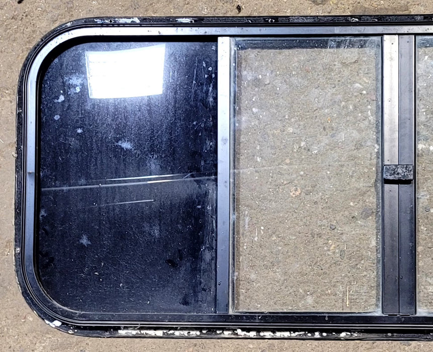 Used Black Radius Opening Window : 40 3/4" W x 16 3/4" H x 3/4" D - Truck Camper Front Slider - Young Farts RV Parts