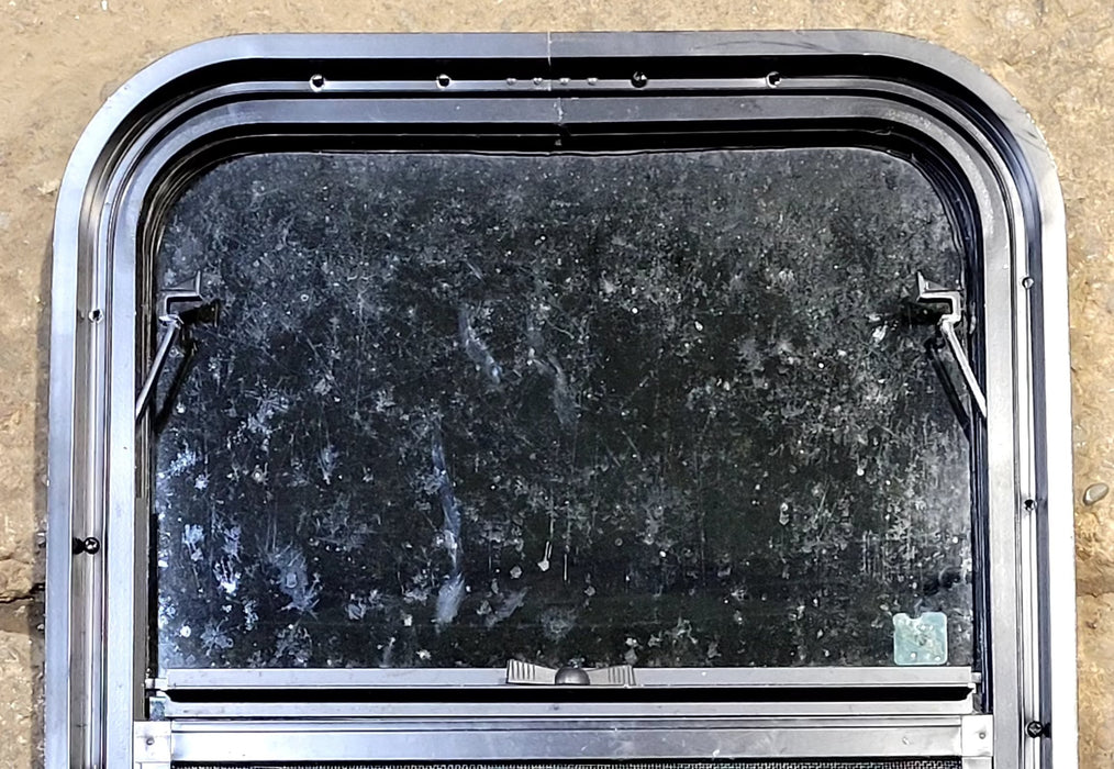 Used Black Radius Opening Window : 17 1/2" W x 21 1/2" H x 1 3/4" D - Young Farts RV Parts