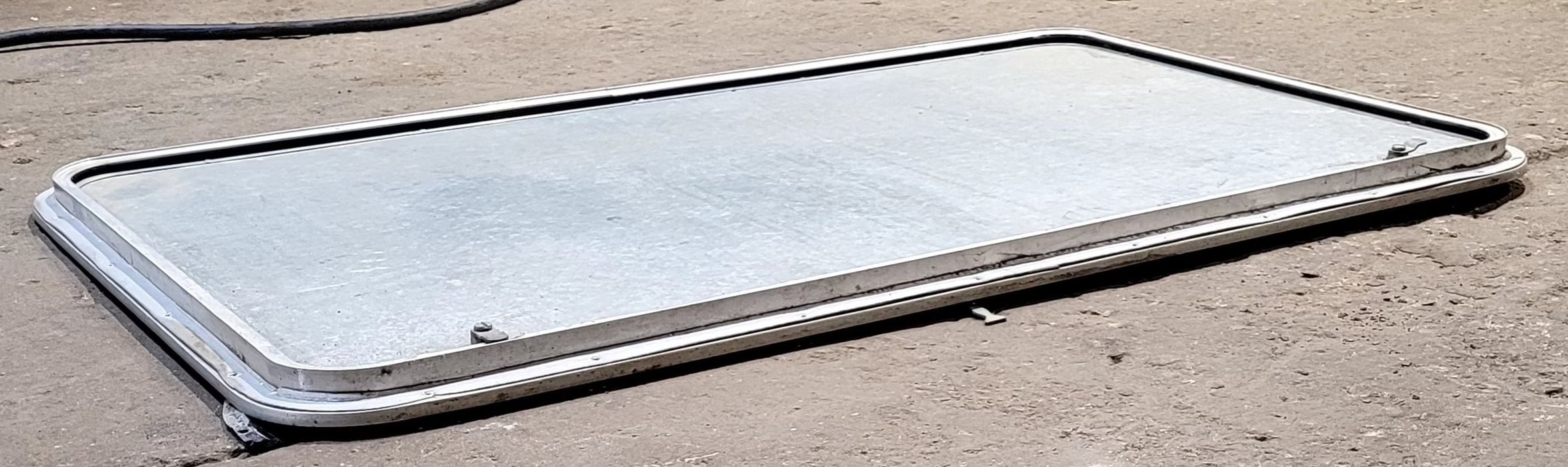 Used Radius Cornered Cargo Door 43 3/4" x 25 3/4" x 3/4" D - Young Farts RV Parts