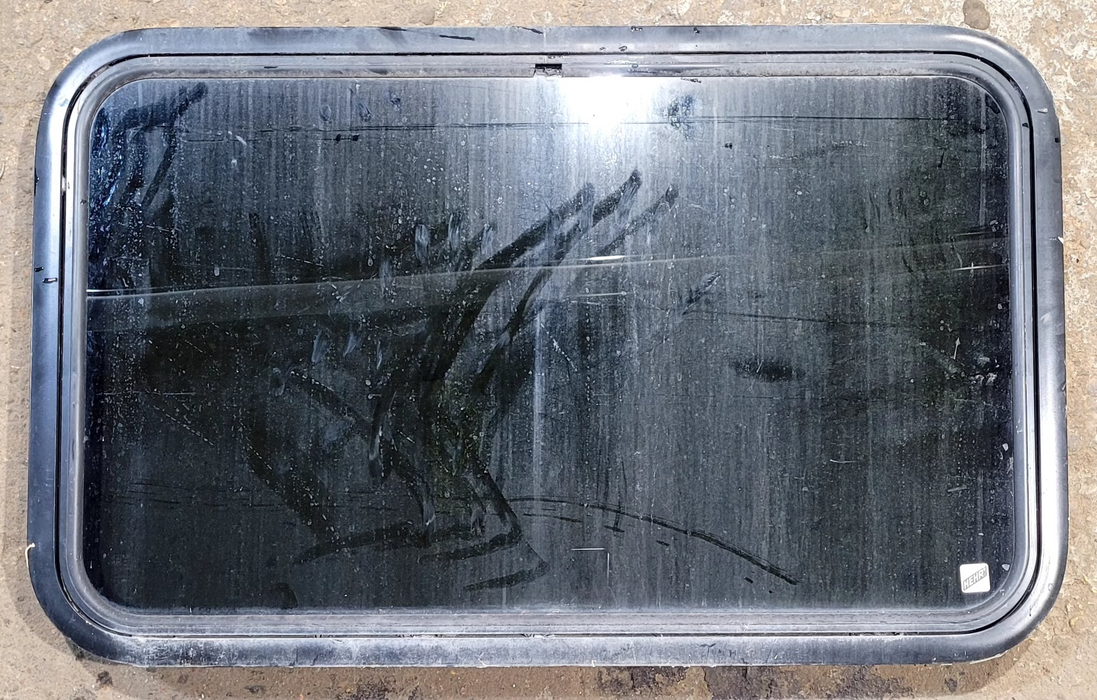 Used Black Radius Emergency Opening Window : 35 1/4" W x 21 1/4" H x 1 1/4" D - Young Farts RV Parts