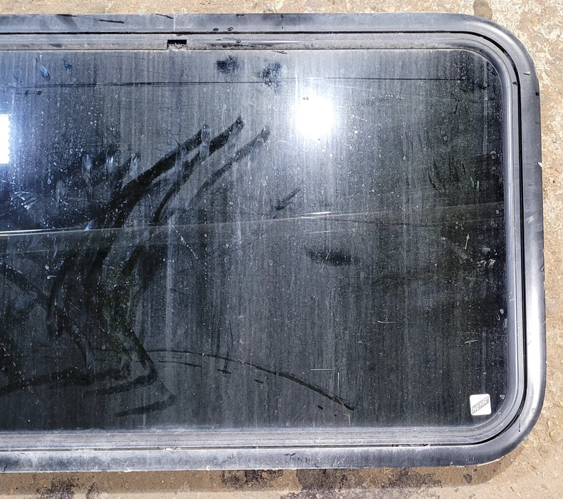 Used Black Radius Emergency Opening Window : 35 1/4" W x 21 1/4" H x 1 1/4" D - Young Farts RV Parts