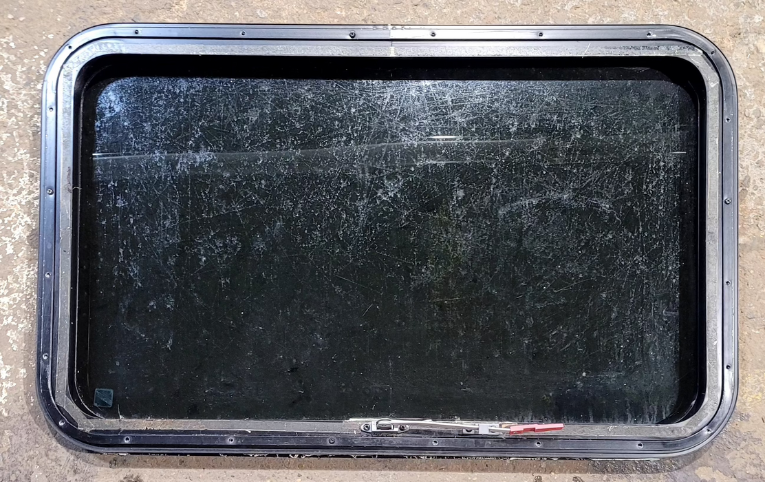 Used Black Radius Emergency Opening Window : 35 1/4" W x 21 1/4" H x 1 1/4" D - Young Farts RV Parts