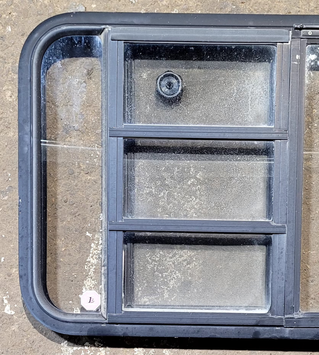 Used Black Radius Emergency Opening Window : 47 1/4" W x 22 1/4" H x 1 3/4" - Young Farts RV Parts