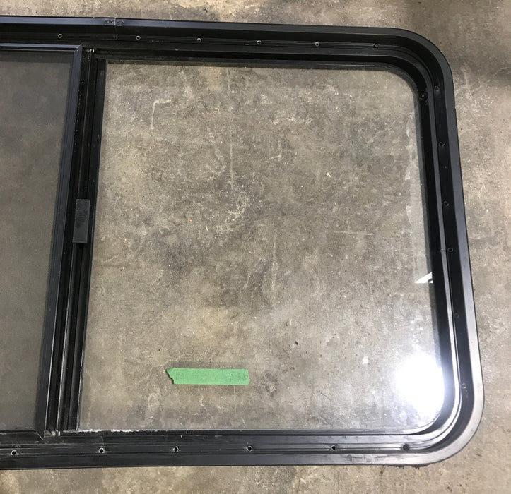 Used Black Radius Opening Window : 45 1/2" W x 25 1/2" H x 2" D - Young Farts RV Parts