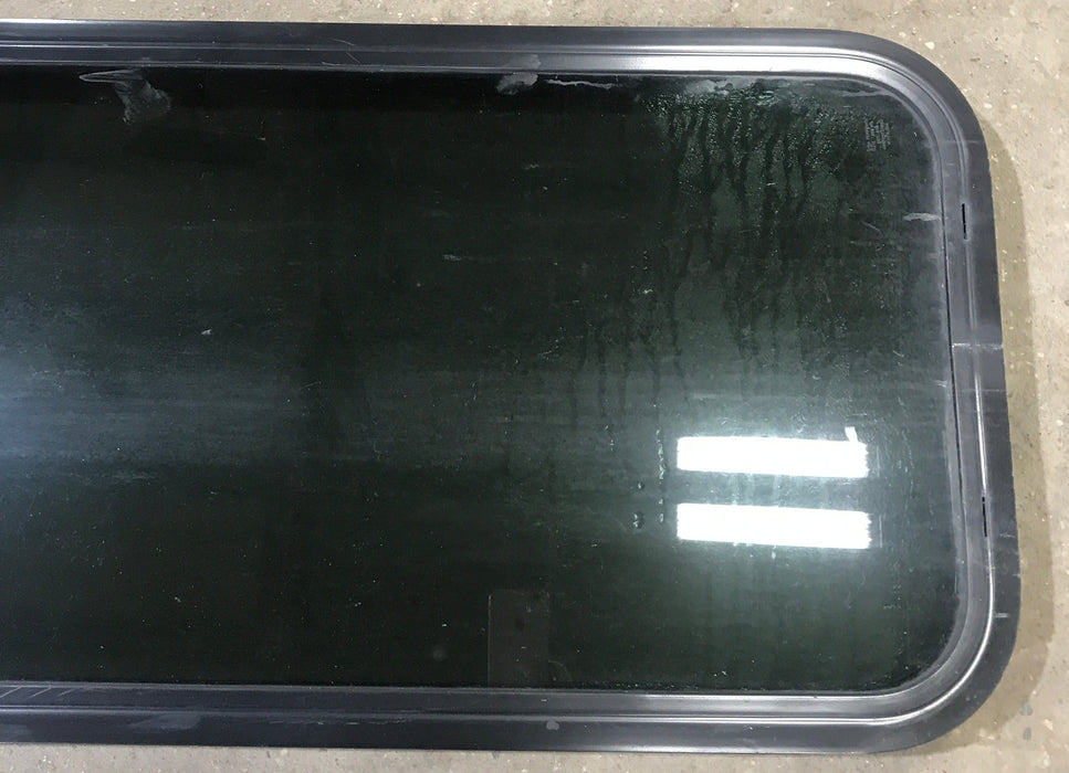 Used Black Radius Non Opening Window : 17 1/2" W x 39 1/2" H x 1 7/8" D