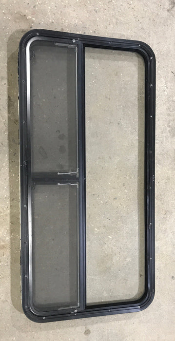 Used Black Radius Window : 53 1/4" W x 25 1/4" H x 2 1/4" D