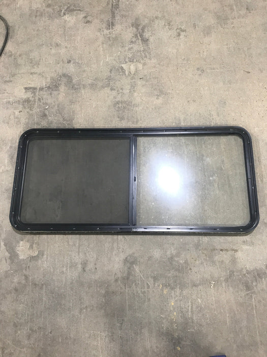Used Black Radius Opening Window : 59 1/2" W X 25 3/4" H X 2" D - Young Farts RV Parts