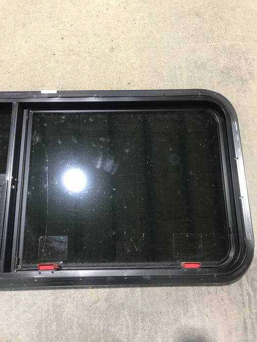 Used Black Radius Emergency Opening Window : 41 1/2" W x 21 1/2" H x 1 7/8"