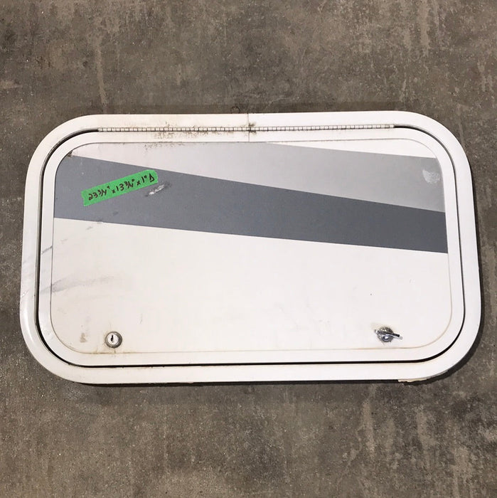 Used White Corner radius cargo door  23 3/4" W x 13 3/4" H x 1"D