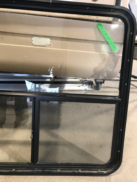 Used Slanted Black Radius Opening Window : 41 1/4" W x 33 3/4" H x 2" D - Young Farts RV Parts