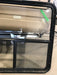 Used Slanted Black Radius Opening Window : 41 1/4" W x 33 3/4" H x 2" D - Young Farts RV Parts