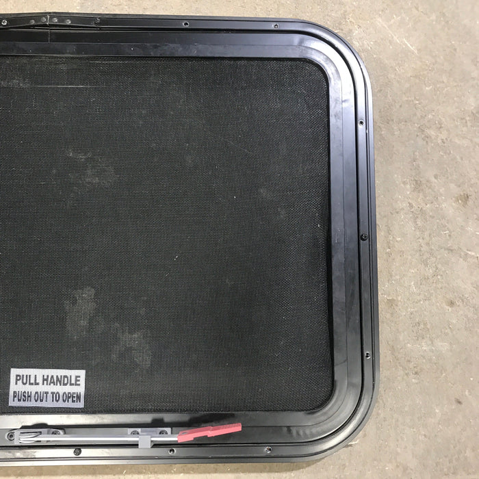 Used Black Radius Emergency Opening Window : 29.5" X 19.5" X 1.5"