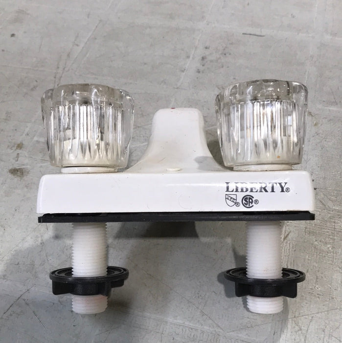 Used 4" Bathroom Faucet, White, Clear Knobs