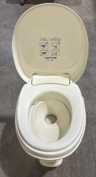 Used Toilet Thetford Toilet, High Profile, Foot Flush, Parchment - Aqua-Magic V , 31688