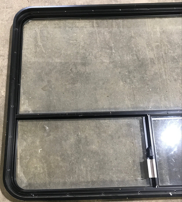 Used Black Radius Opening Window : 48 1/4" W x 35 3/4" H x 1 7/8" D