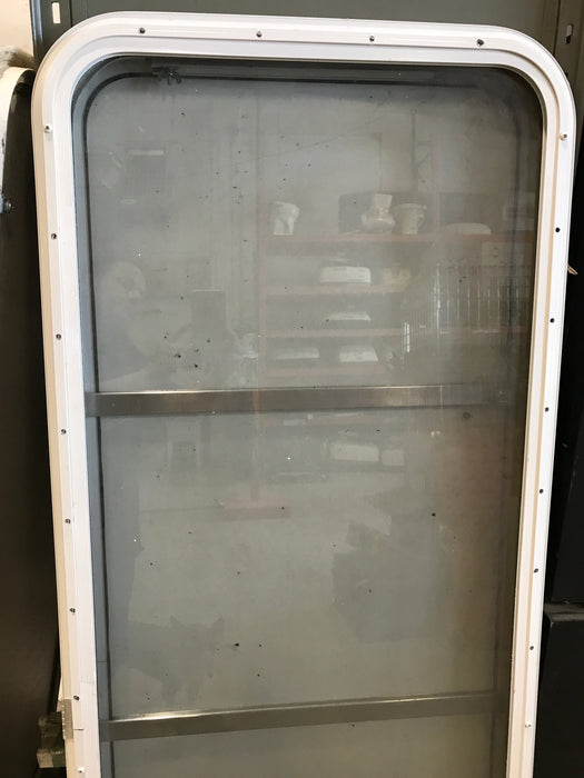 Used Radius Opening Rock Guard Covered Window: 59 1/2"  X 21 1/2"  X 1 1/2" D - Young Farts RV Parts