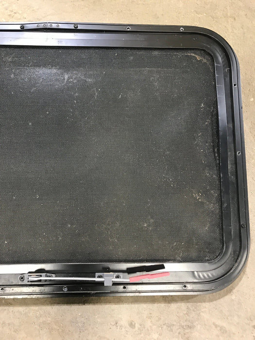 Used Black Radius Emergency Opening Window : 29.5" X 19.5" X 1.5"