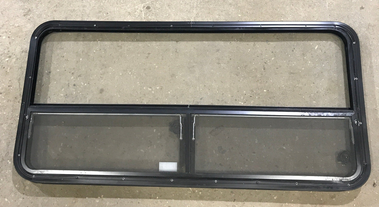 Used Black Radius Window : 53 1/4" W x 25 1/4" H x 2 1/4" D