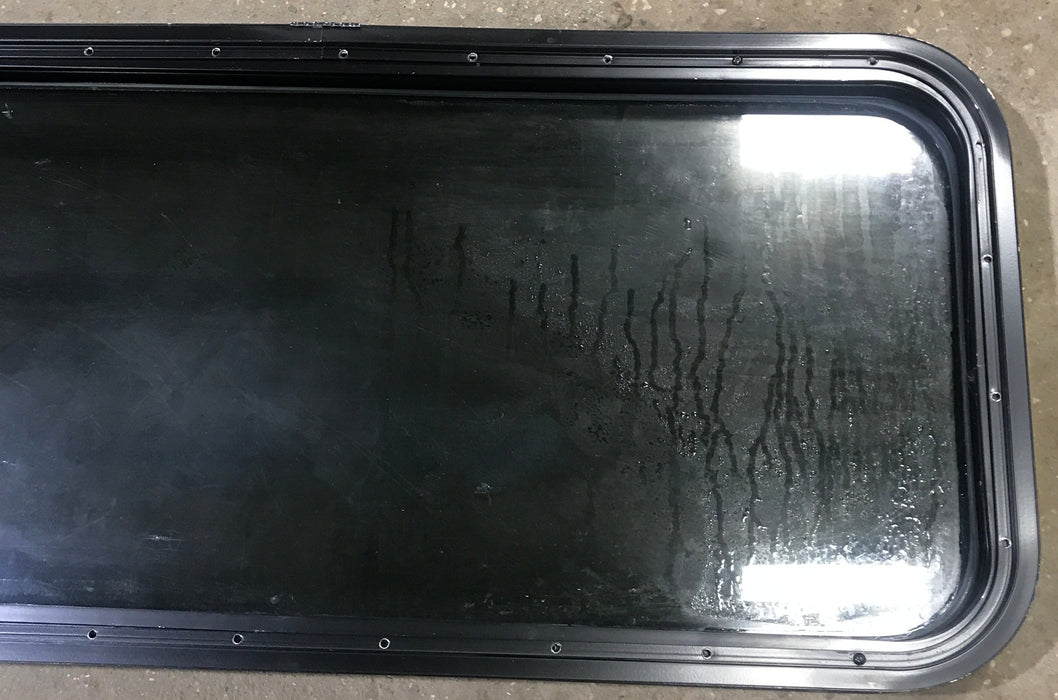 Used Black Radius Non Opening Window : 17 1/2" W x 39 1/2" H x 1 7/8" D