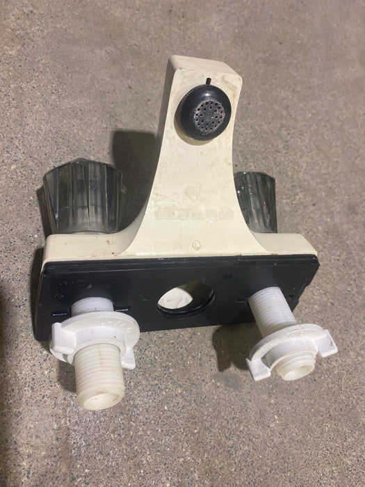 Used 4" Bathroom Faucet, Off White, Smoked Knobs