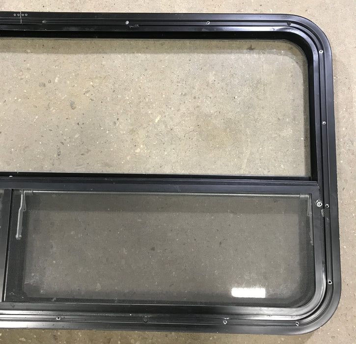 Used Black Radius Window : 53 1/4" W x 25 1/4" H x 2 1/4" D
