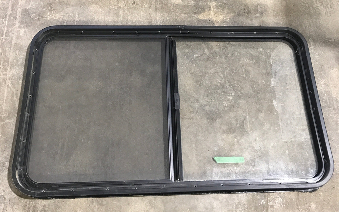 Used Black Radius Opening Window : 45 1/2" W x 25 1/2" H x 2" D - Young Farts RV Parts