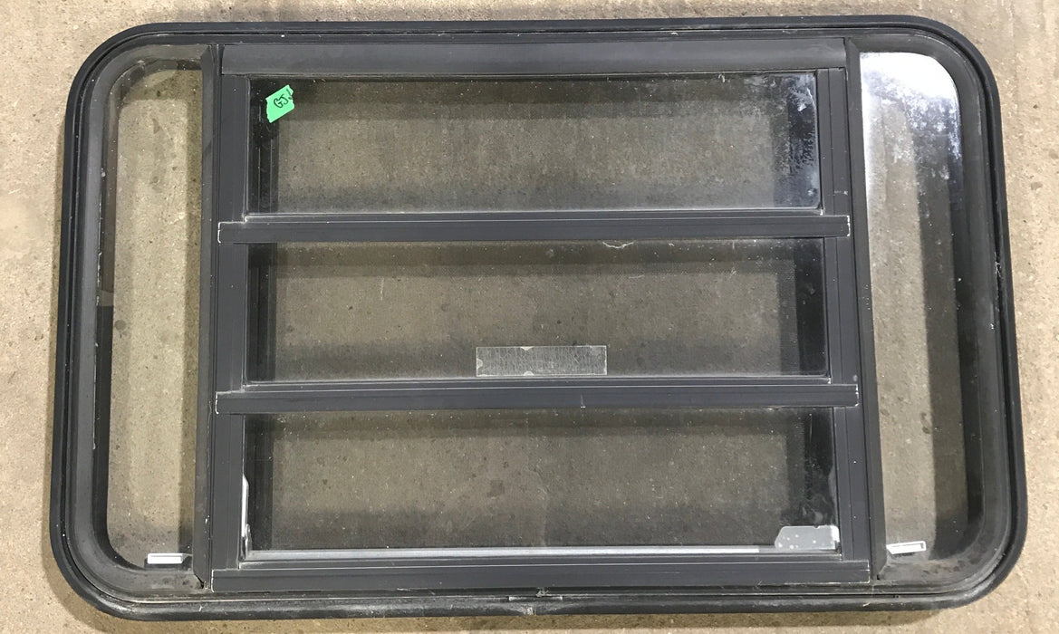 Used Black Radius Emergency Opening Window : 35 1/4" W x 21 1/4" H x 1 7/8" D