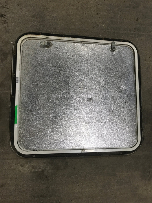 Used Radius Corner cargo door  23 3/4" W  x 21 3/4" H x  1/2" D